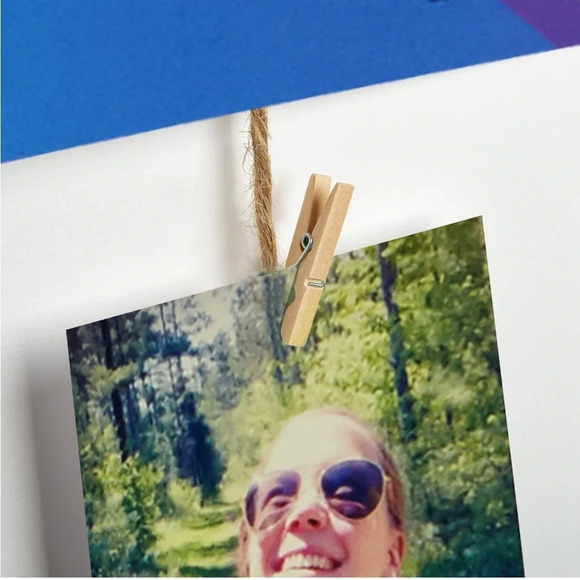 Hanging photo collage with two wood wall mounts, and rope with clothespins - Picture 9 of 12